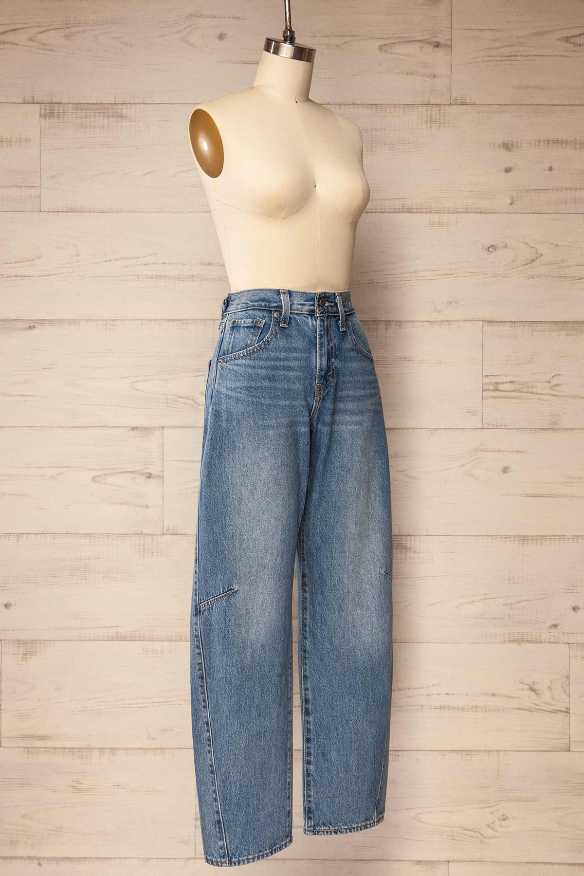 side view of Douma Blue Barrel Denim Pants at La petite garçonne