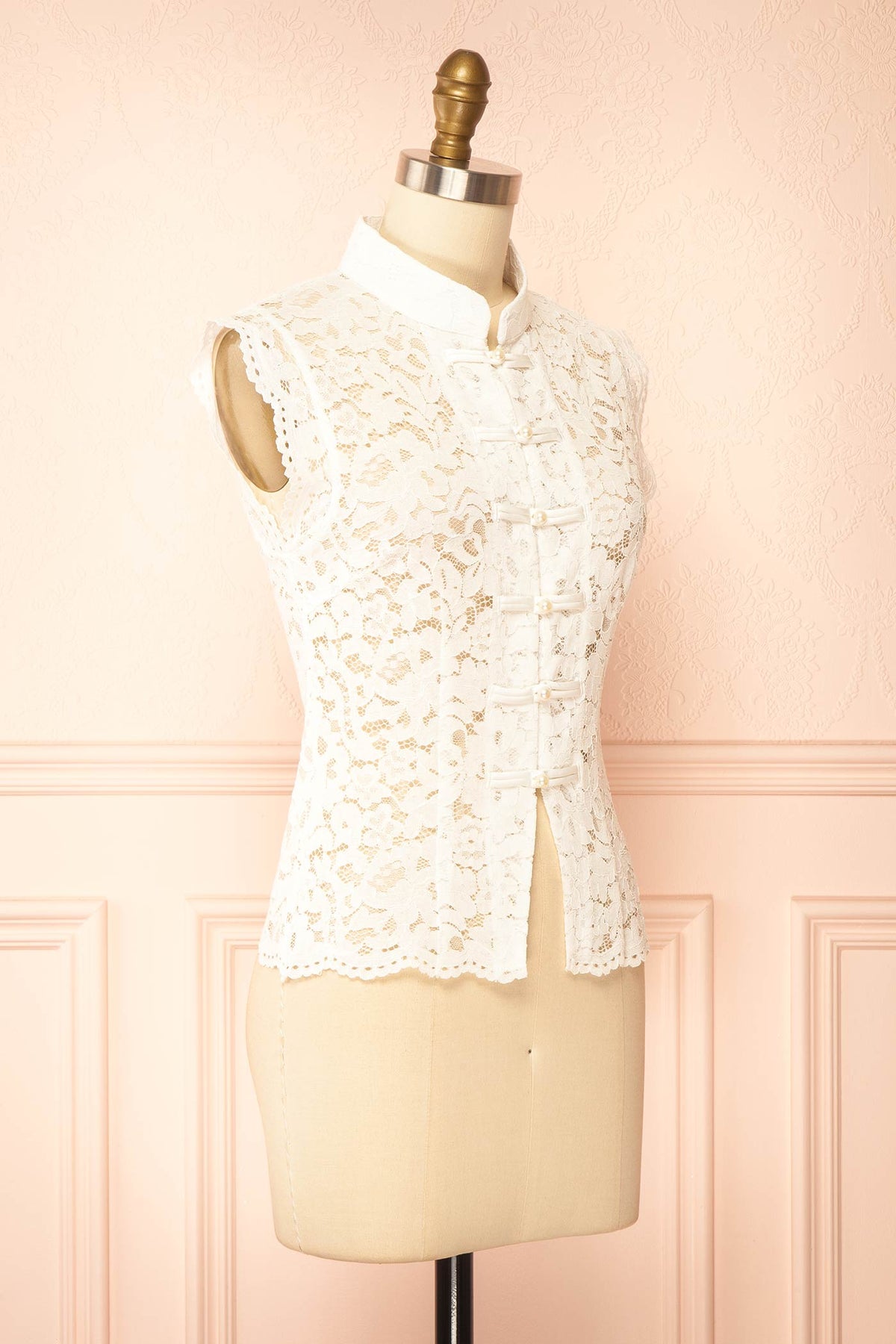 side view of Edmai White Sleeveless Lace Top with Collar at Boutique 1861