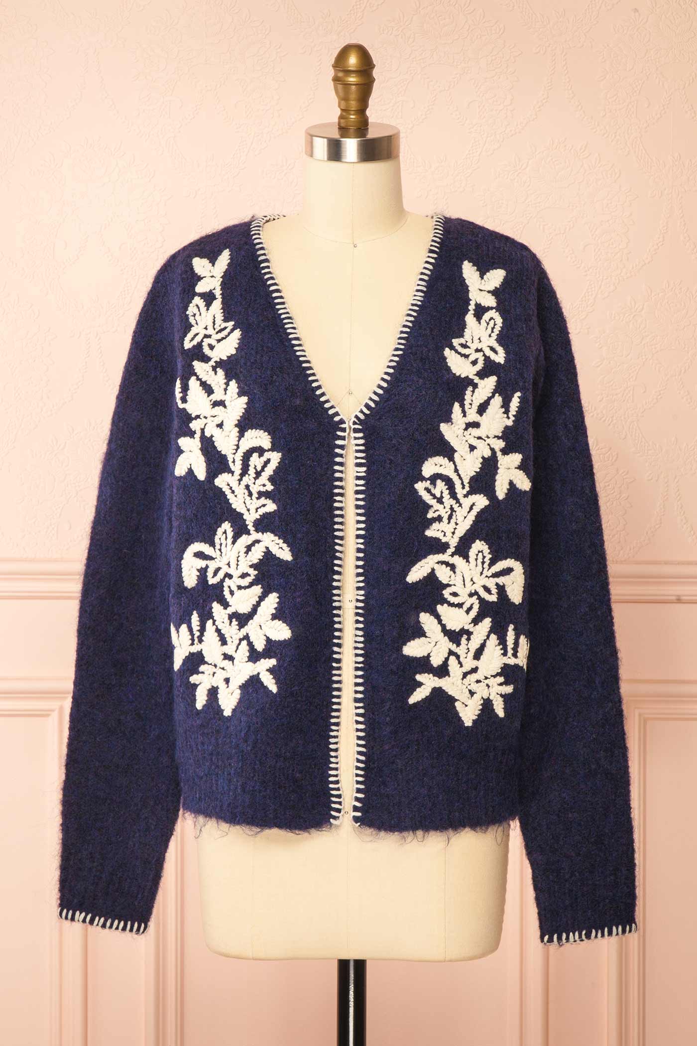 front view of Edulia Navy Knit Cardigan with Floral Embroidery at La petite garçonne