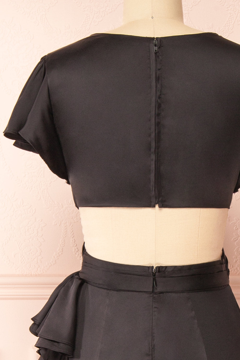 Eirlys Black Asymmetrical Satin Dress w/ Ruffles | Boutique 1861 back close-up