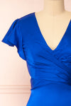 Eirlys Blue Asymmetrical Satin Dress w/ Ruffles | Boutique 1861 front close-up