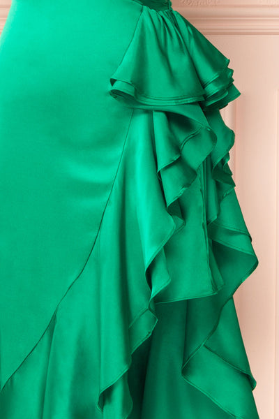 Eirlys Green Asymmetrical Satin Dress w/ Ruffles | Boutique 1861 bottom close-up