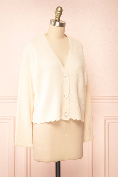 Elarisse Ivory Knit Cardigan w/ Heart Buttons | Boutique 1861 side view