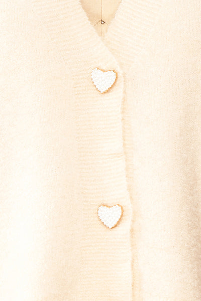 Elarisse Ivory Knit Cardigan w/ Heart Buttons | Boutique 1861 fabric