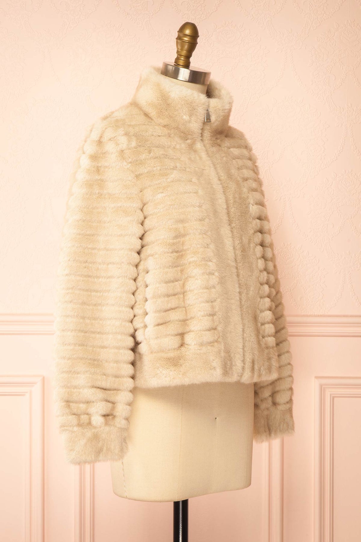side view of Elbea Ivory Faux-Fur Ribbed Jacket with Pockets at Boutique 1861