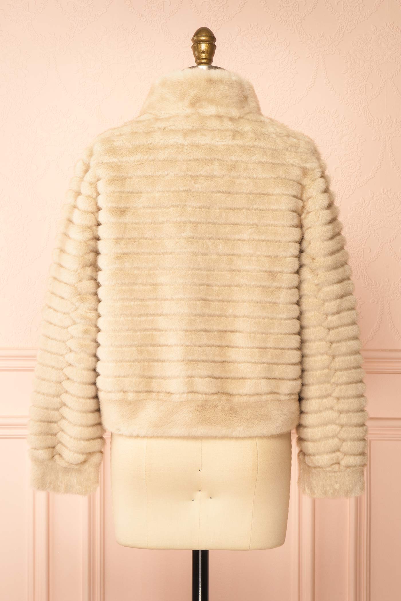 back view of Elbea Ivory Faux-Fur Ribbed Jacket with Pockets at Boutique 1861