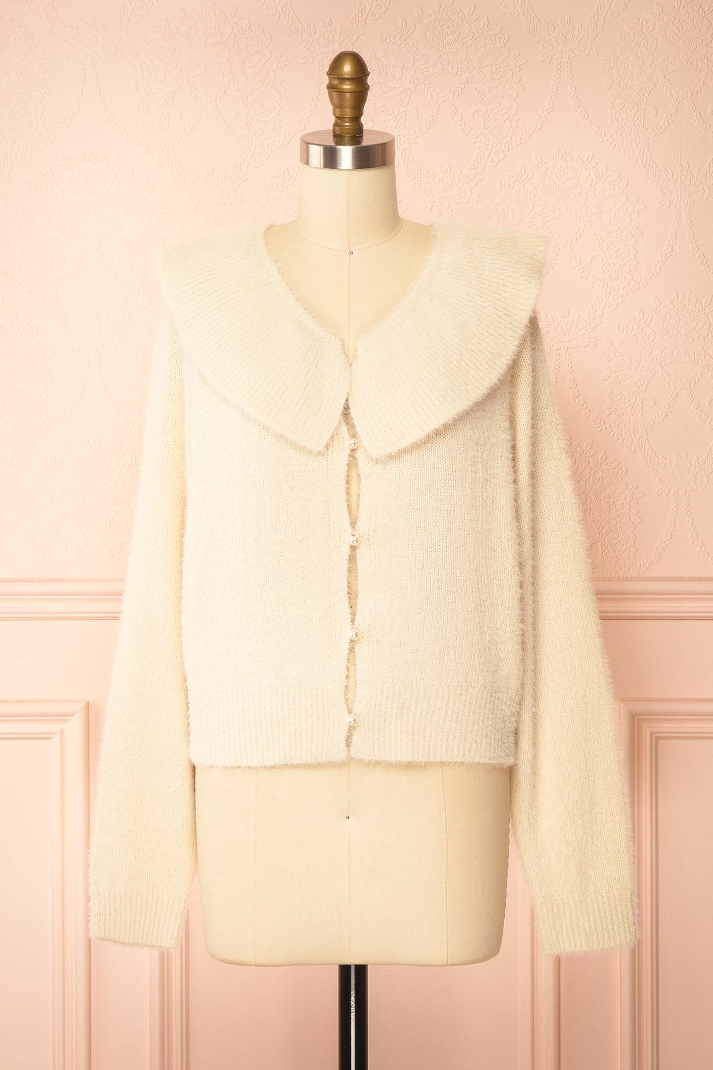 front view of Eliada Beige Knit Cardigan with Pearl Buttons at Boutique 1861