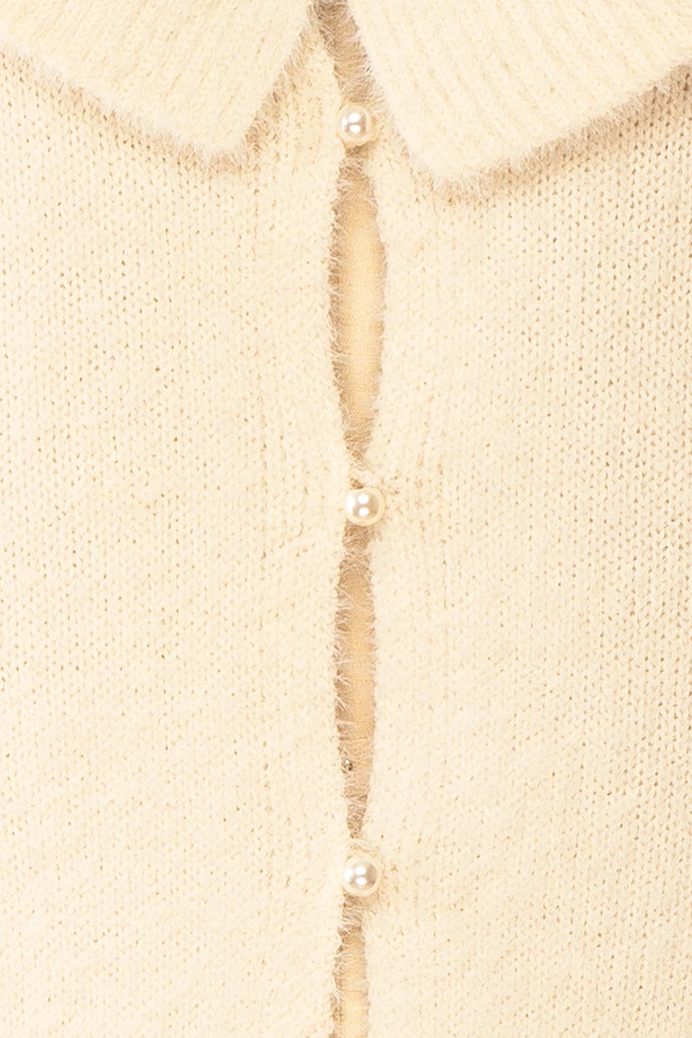 fabric view of Eliada Beige Knit Cardigan with Pearl Buttons at Boutique 1861