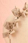 Elite Beige Thin Headband w/ Bows | Boutique 1861 close-up