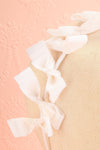 Elite White Thin Headband w/ Bows | Boutique 1861 close-up