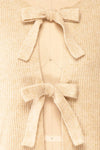 Elpida Beige Knit Cardigan w/ Bows | Boutique 1861 fabric