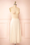 Elvandra Beige Corduroy A-line Midi Skirt | Boutique 1861 side clsoe-up