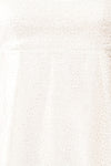 Eoya White Sparkly Babydoll Dress | Boutique 1861 fabric