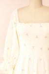 Estelle Ivory Midi Dress w/ Floral Embroidery | Boutique 1861 front close-up