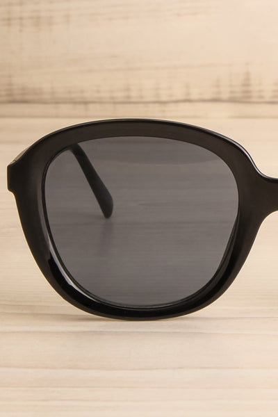 Etivaz Black Sunglasses w/ Blue Tint | La petite garçonne front close-up