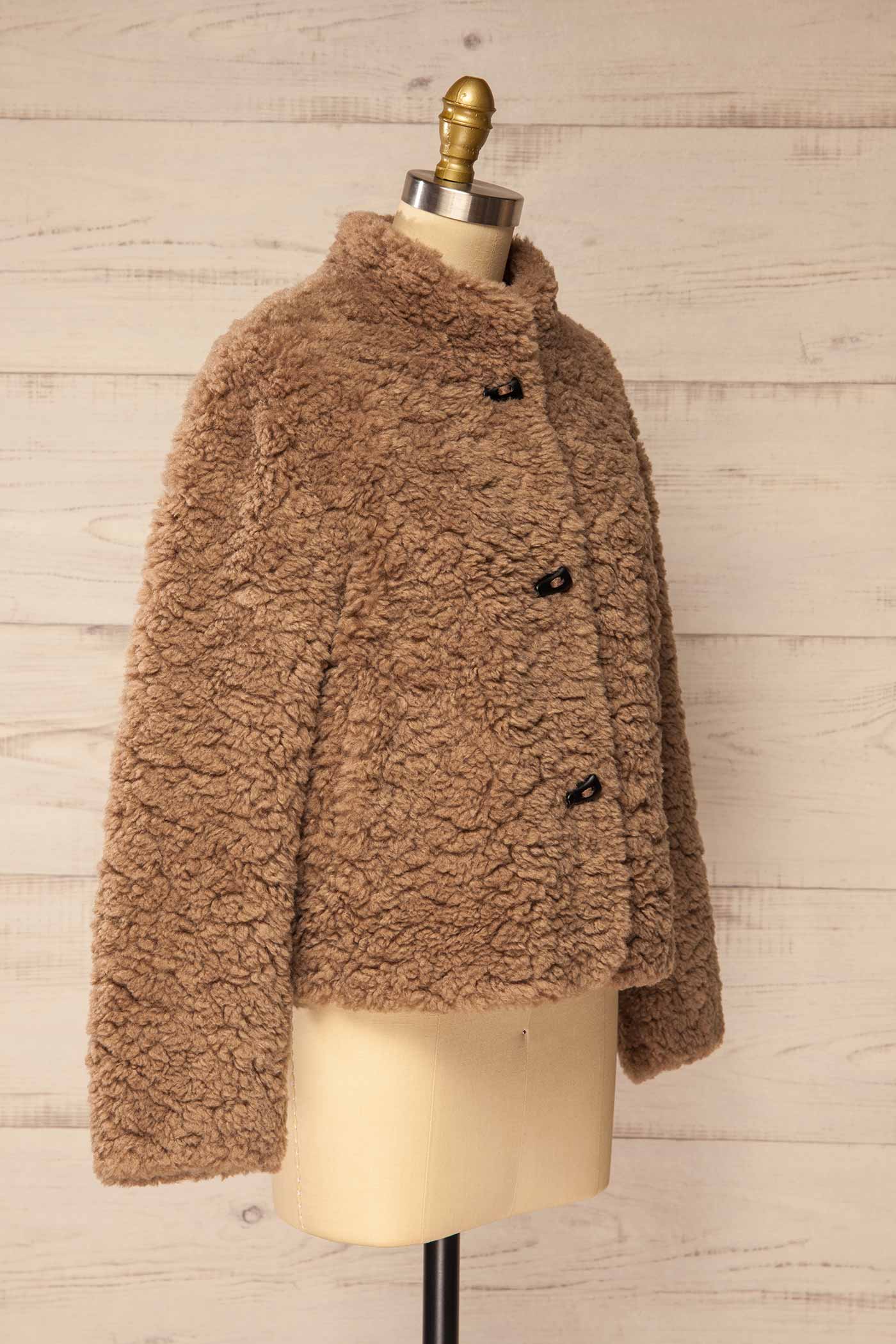 side view of Fadina Brown Toggle Closures Sherpa Jacket with Pockets at La petite garçonne
