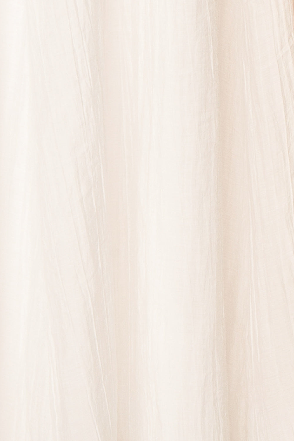 Fallon White Maxi Dress w/ Long Sleeves | Boutique 1861 fabric