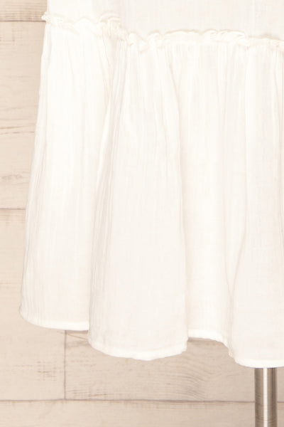 Fannar White A-line Midi Dress | La petite garçonne bottom close-up