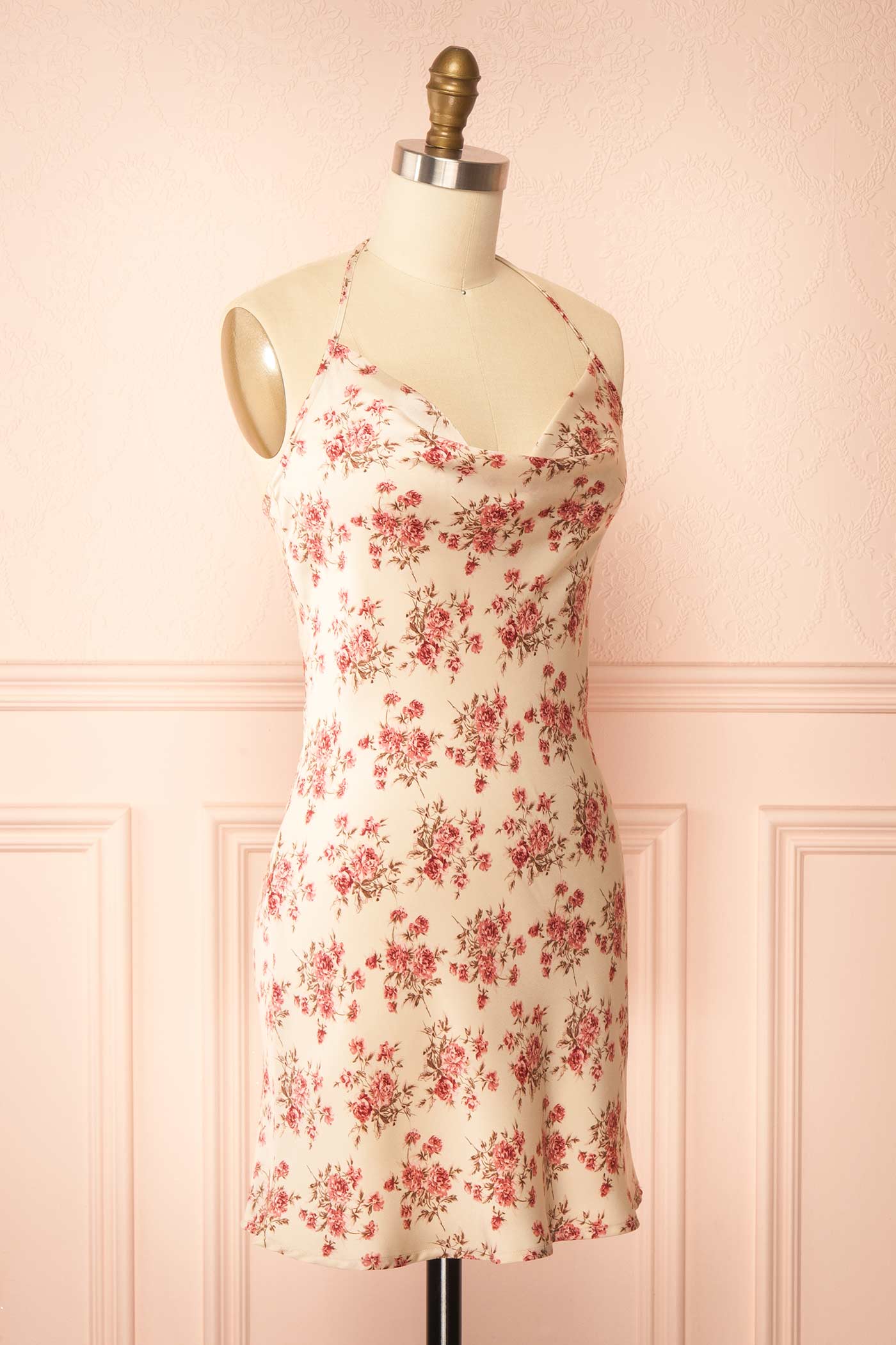 Sideview Fatoumata Short Cream Floral Halter Dress with Cowl Neck at boutique 1861