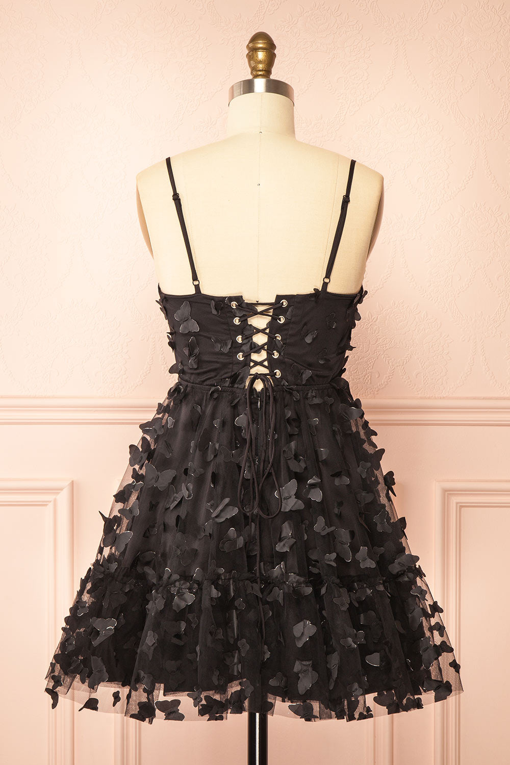 back view of sewing Mannequin wearing Faya Black Short Corset Dress with Butterflies From Boutique 1861