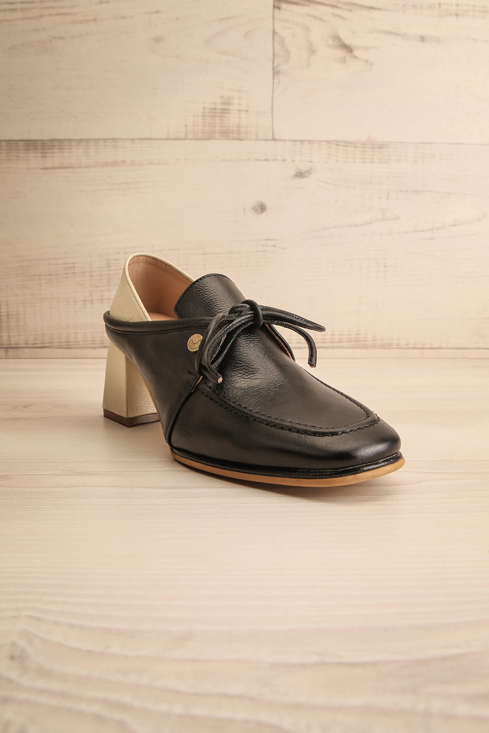 Focus Black Bicolored Heeled Loafer | La petite garçonne front view