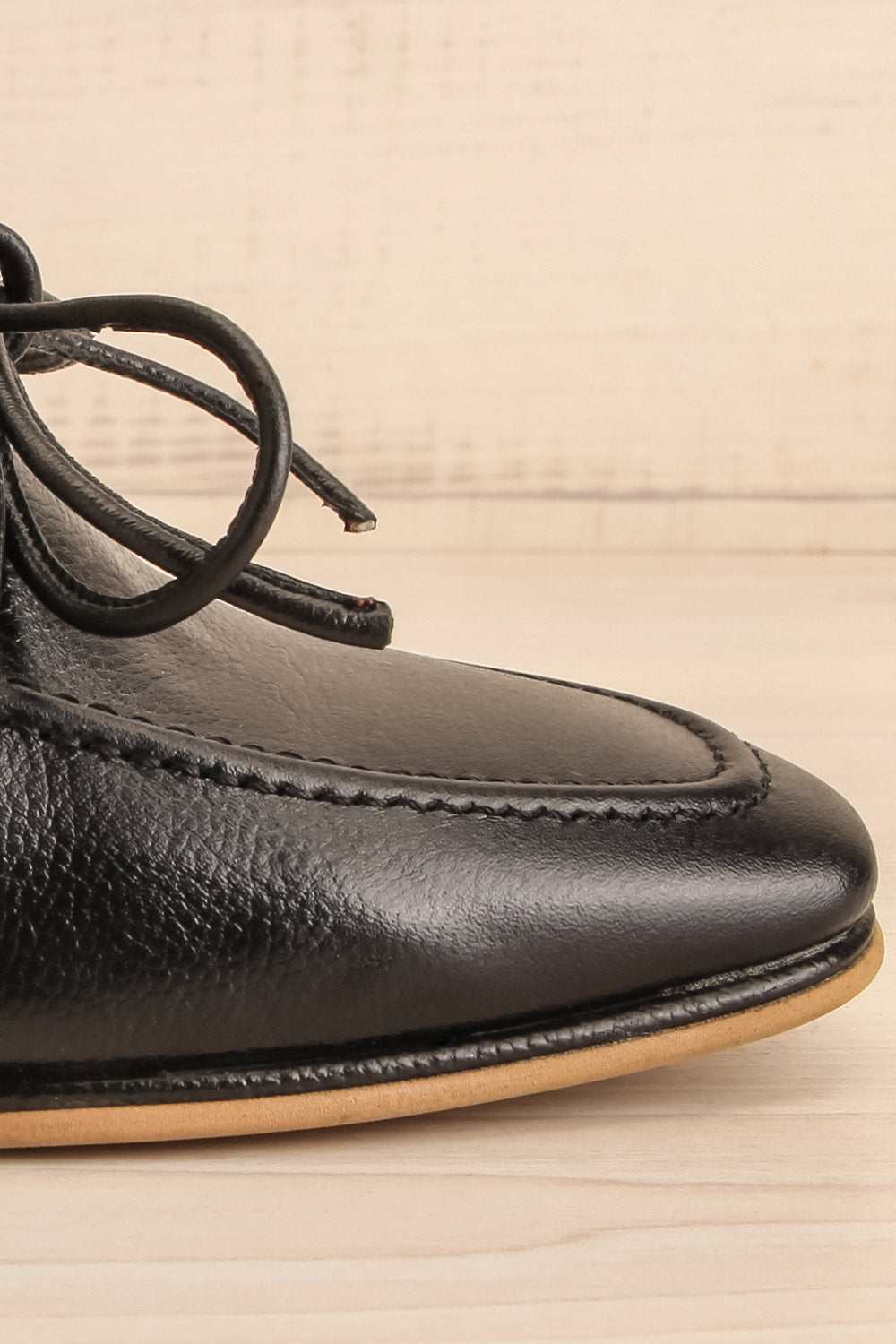 Focus Black Bicolored Heeled Loafer | La petite garçonne side front close-up