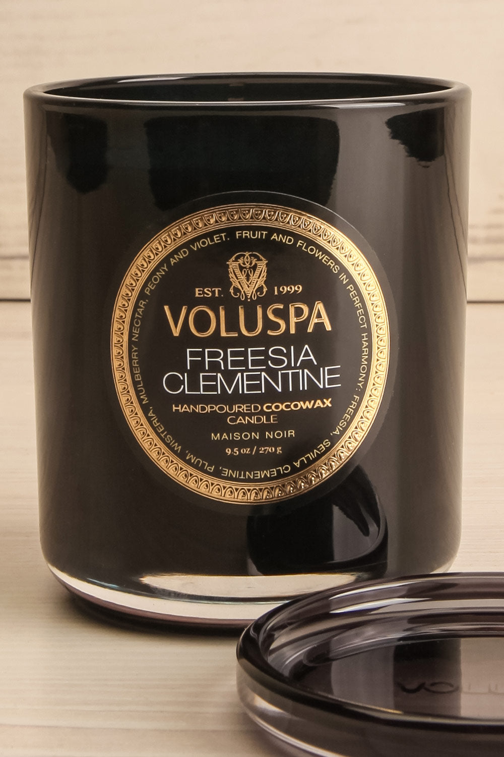 Freesia Clementine Classic Candle by Voluspa | Maison garçonne open close-up