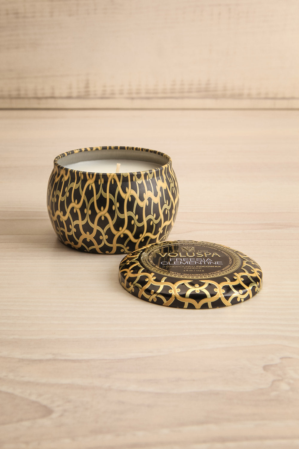 Freesia Clementine Mini Tin Candle by Voluspa | Maison garçonne open view