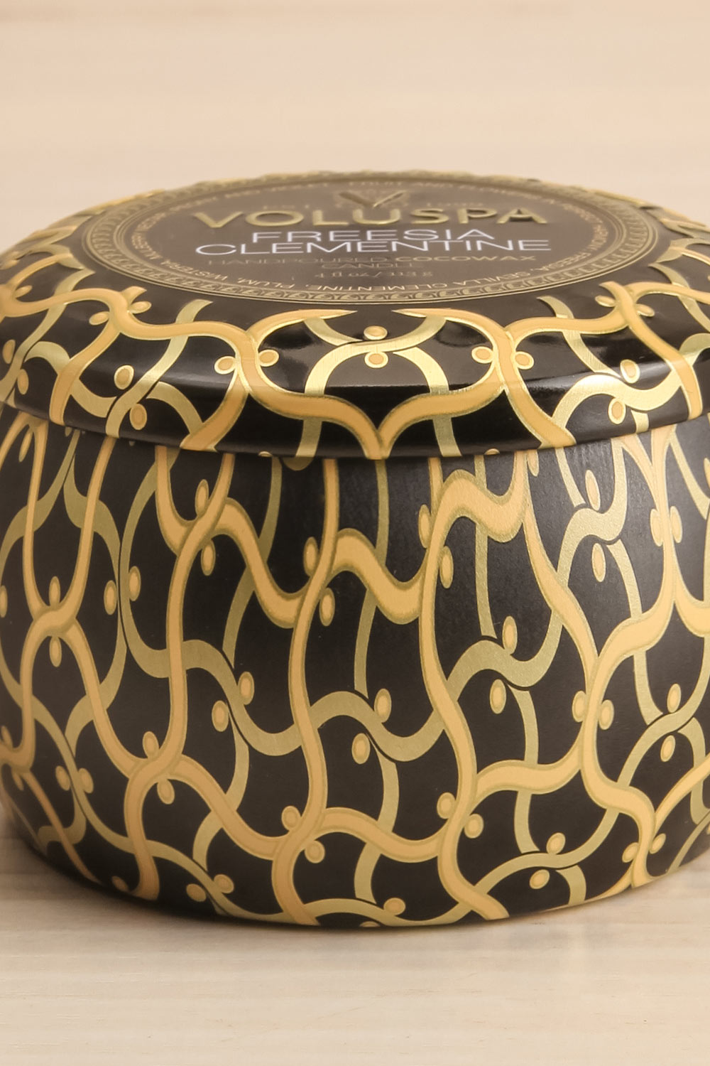 Freesia Clementine Mini Tin Candle by Voluspa | Maison garçonne close-up