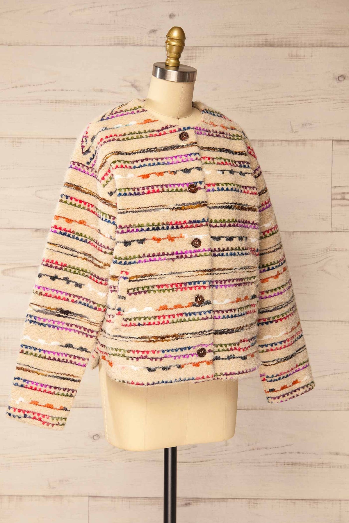 side view of Gamelbert Beige Jacket with Multicoloured Stripes at La petite garçonne