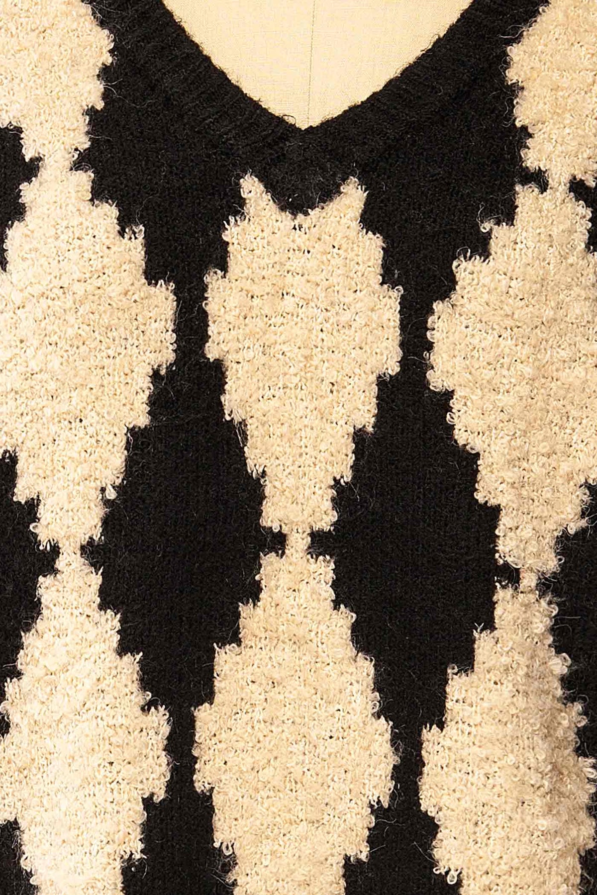 fabric view of Gawler Black Oversized Argyle V-Neck Knit Sweater at La petite garçonne