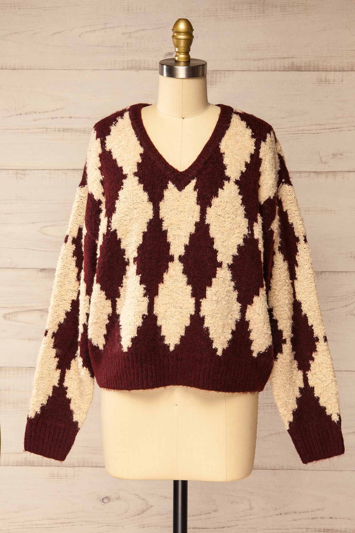front view of Gawler Burgundy Oversized Argyle V-Neck Knit Sweater at La petite garçonne