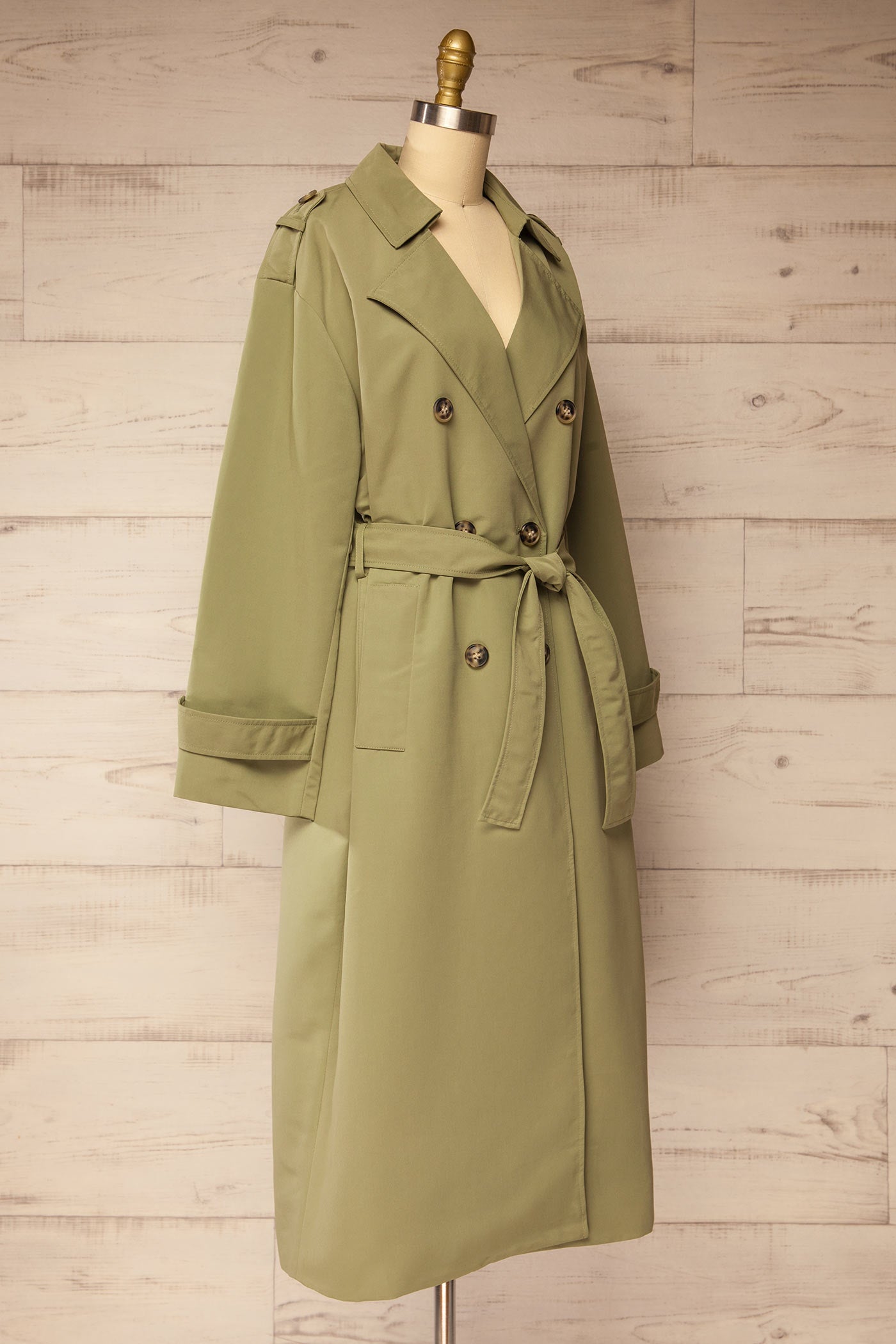 side view of Gembloux Sage Double Breasted Trench Coat at La petite garçonne