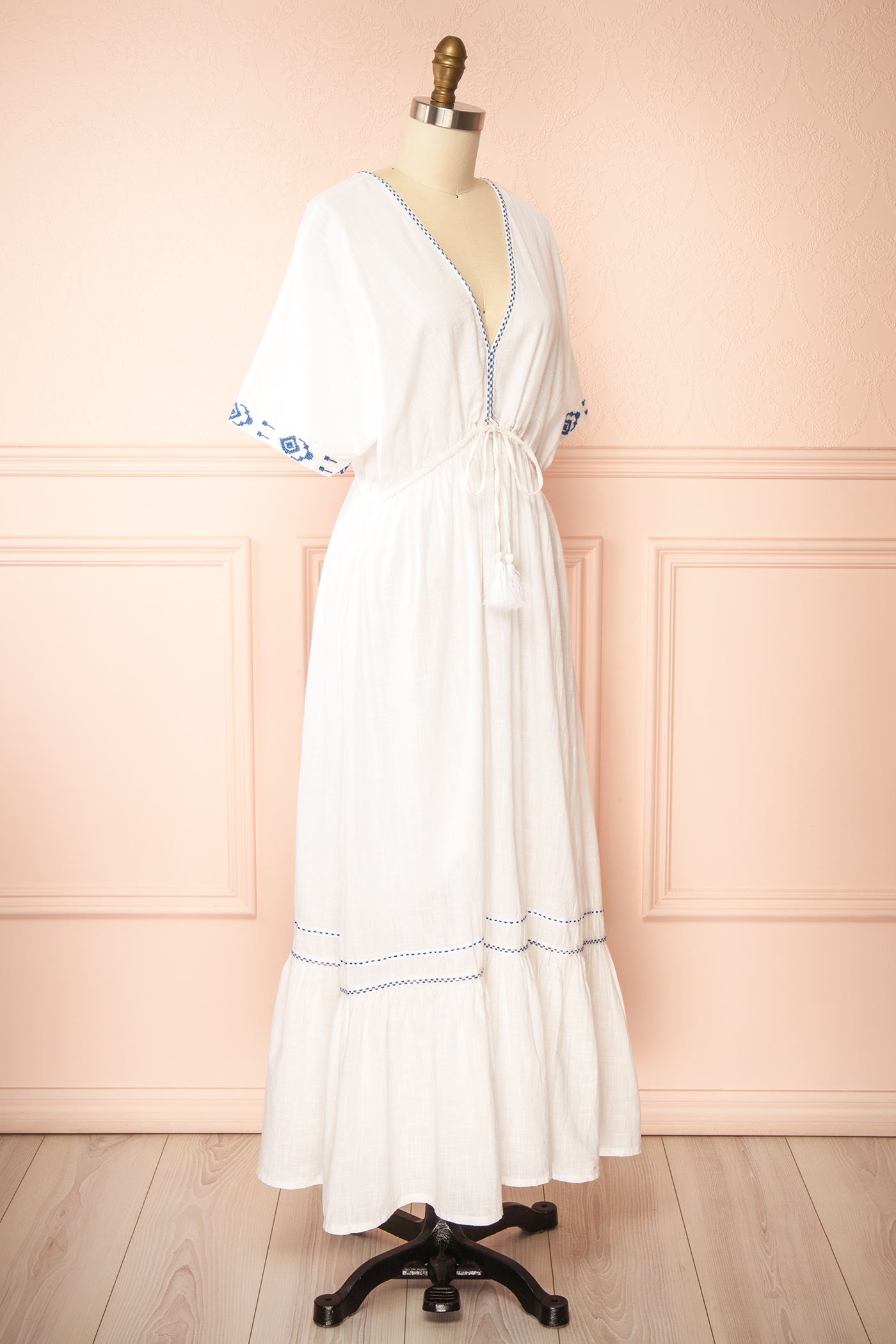 Sideview Georgette Embroidered White V-Neck Maxi Dress with Tassel Tie at boutique 1861
