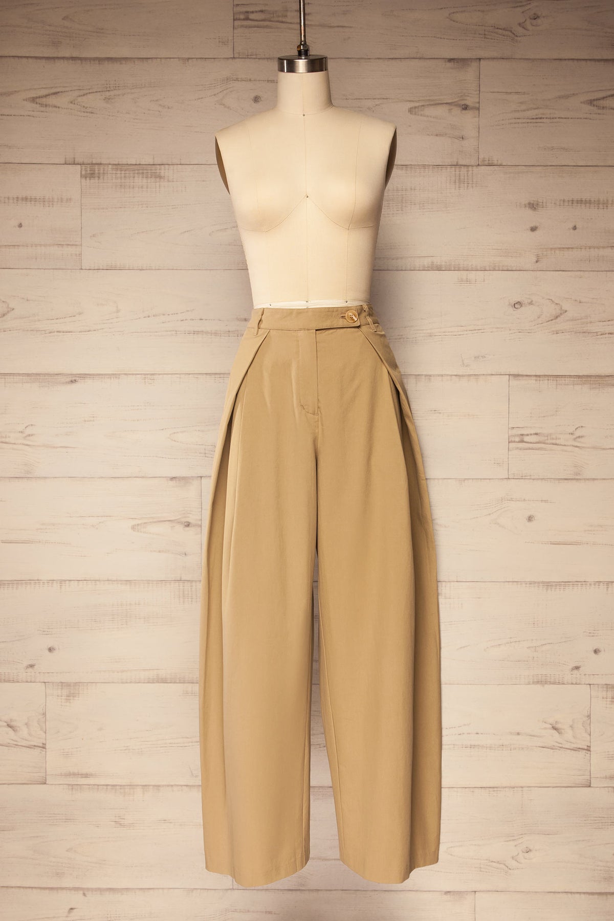 front view of Geraldton Beige High-Waisted Pleated Wide-Leg Pants at La petite garçonne