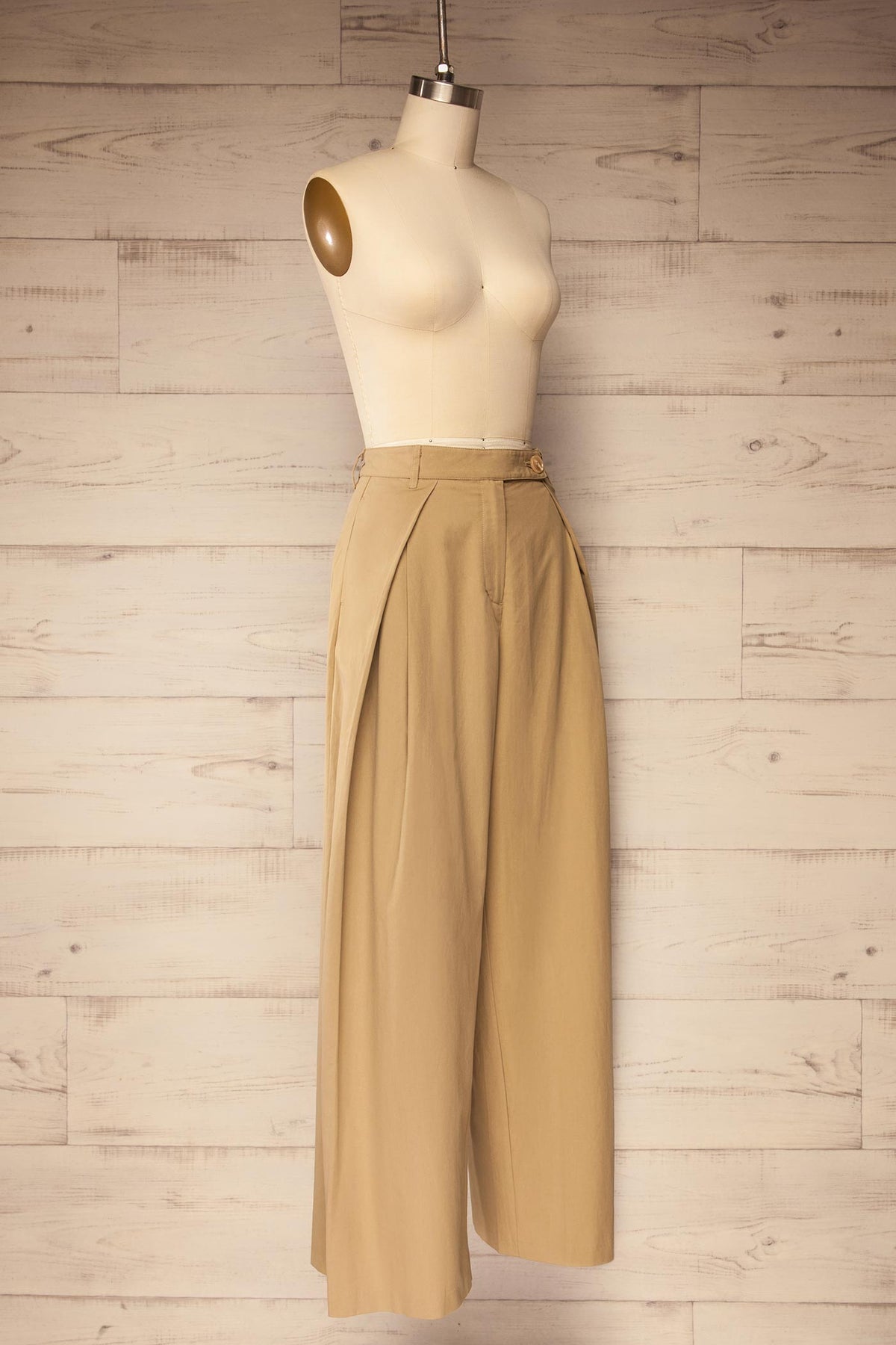 side view of Geraldton Beige High-Waisted Pleated Wide-Leg Pants at La petite garçonne
