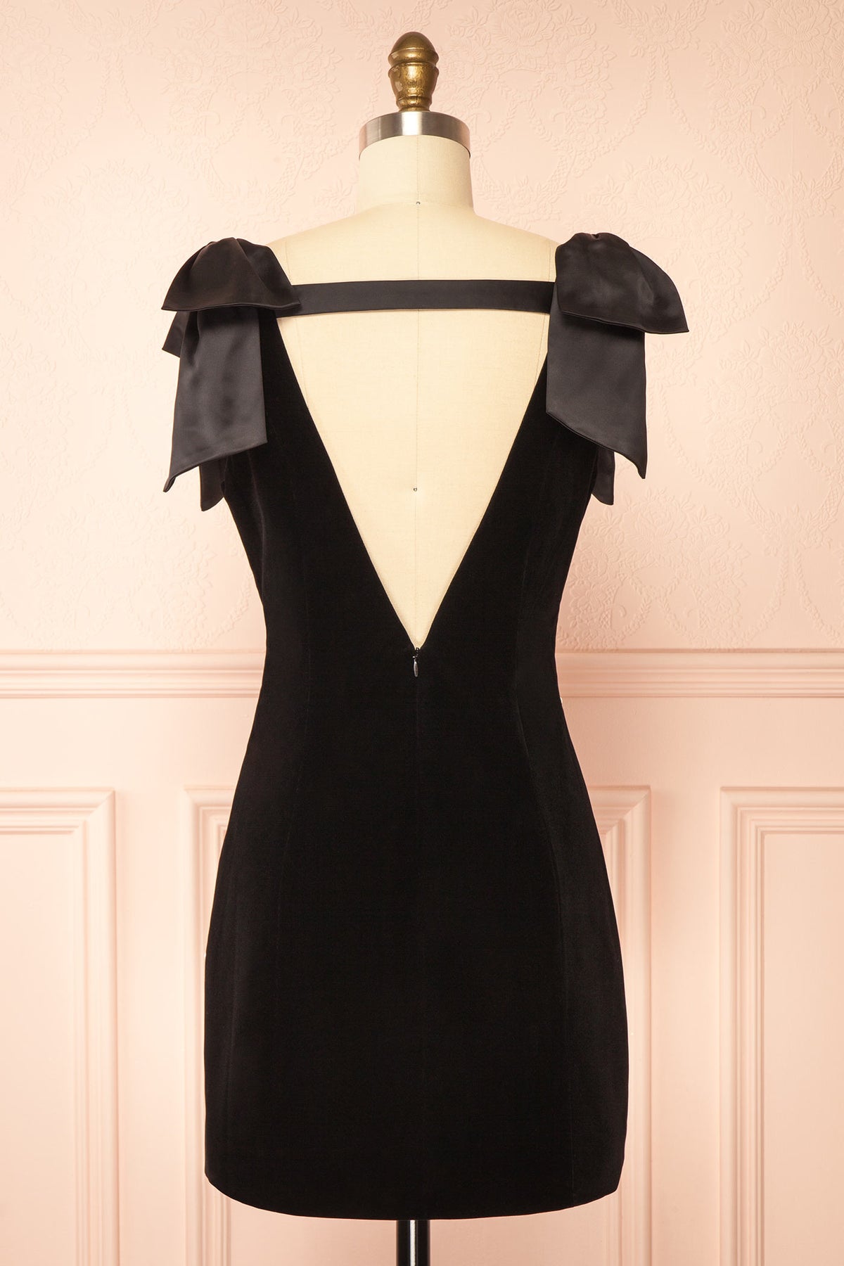 Back view of Geynneth Black Velvet Pearl Embellished Bow Shoulder Mini Dress at Boutique 1861 