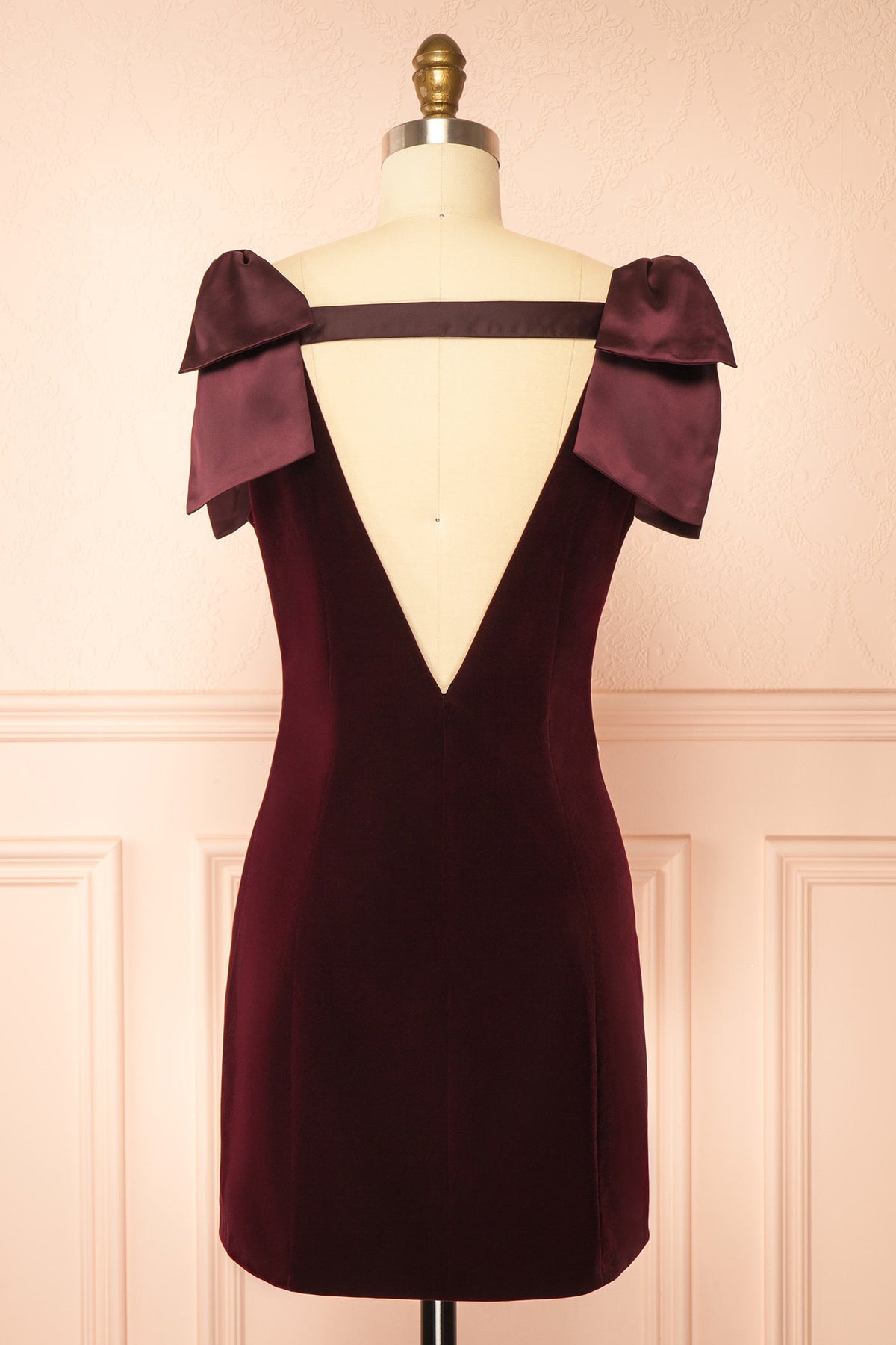 Back view of Geynneth Burgundy Velvet Pearl Embellished Bow Shoulder Mini Dress at Boutique 1861 