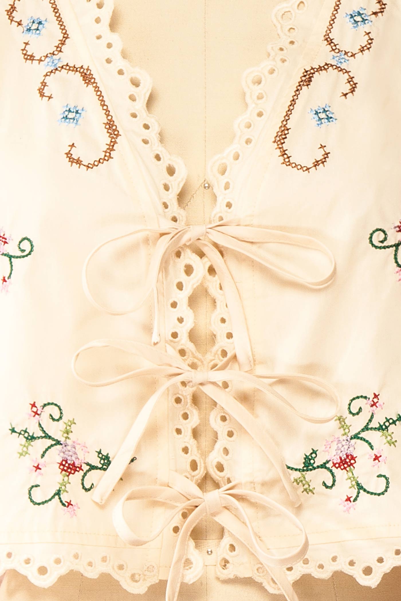 Close-up Glenna Beige Embroidered Cropped Top at boutique 1861