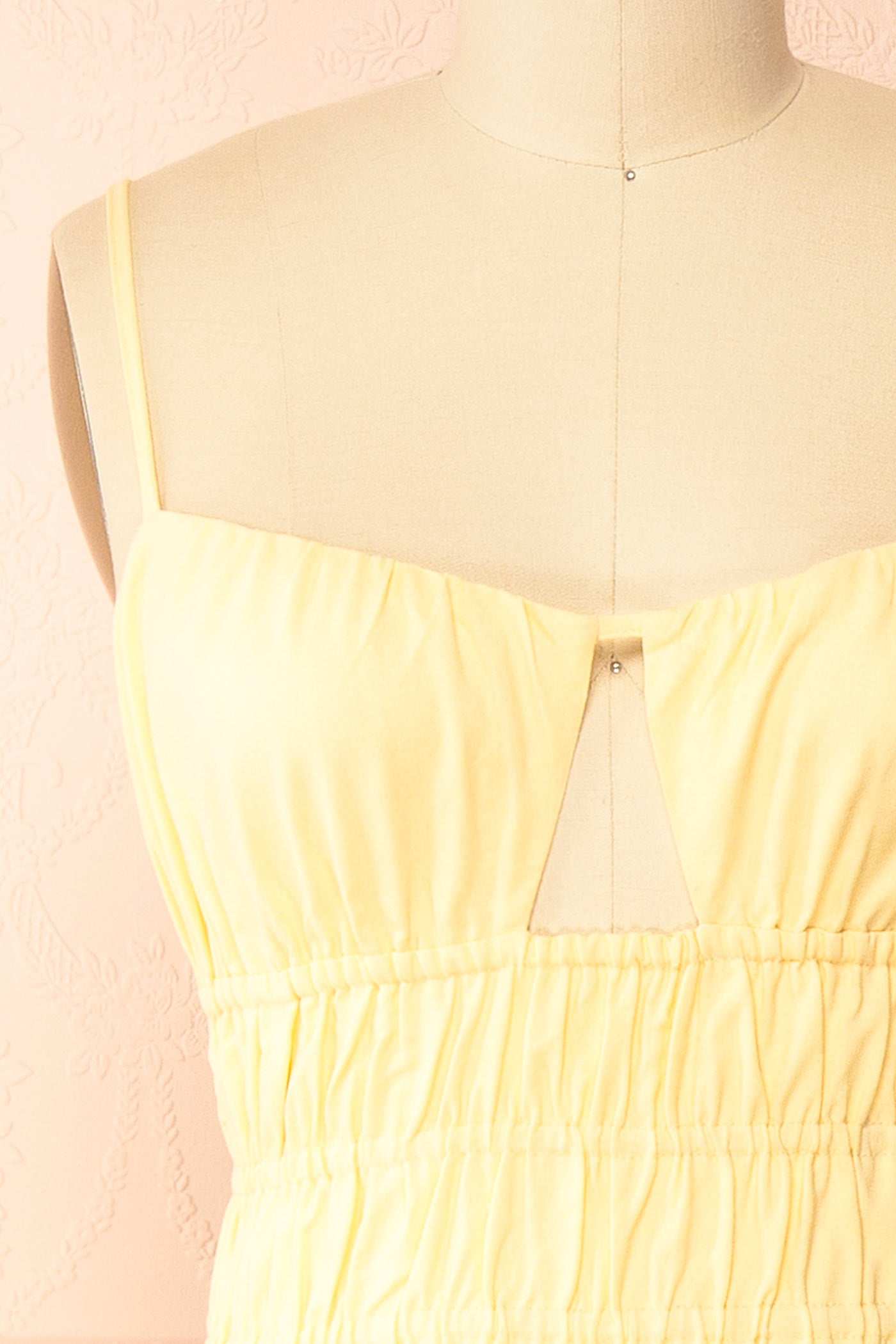 Close-up view Grazia Yellow Smocked Waist Maxi Dress with Cutout Detail at la boutique 1861