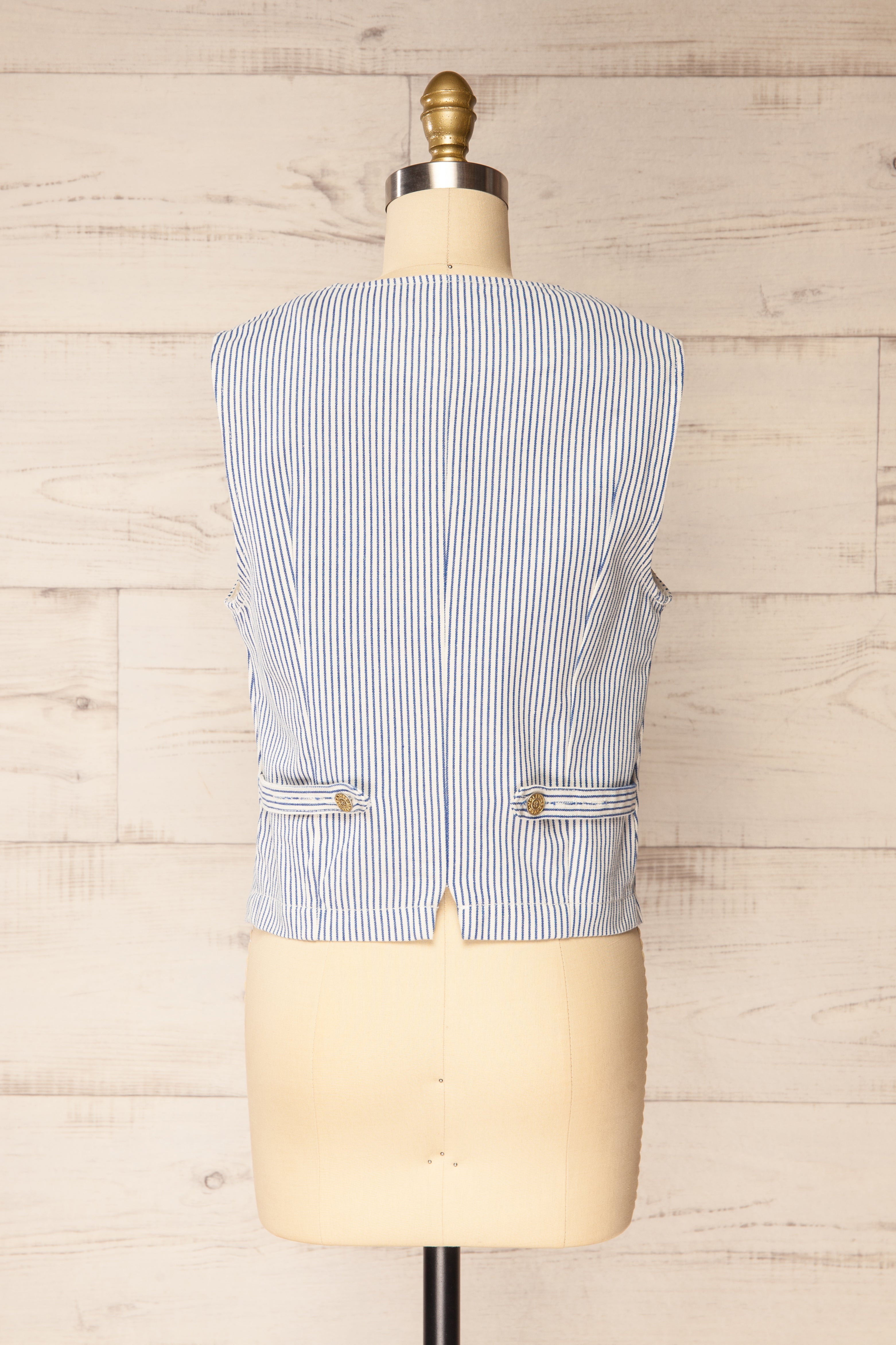 Backview of Hajipur White and Blue Striped Denim Vest with Back Detail at la petite garçonne