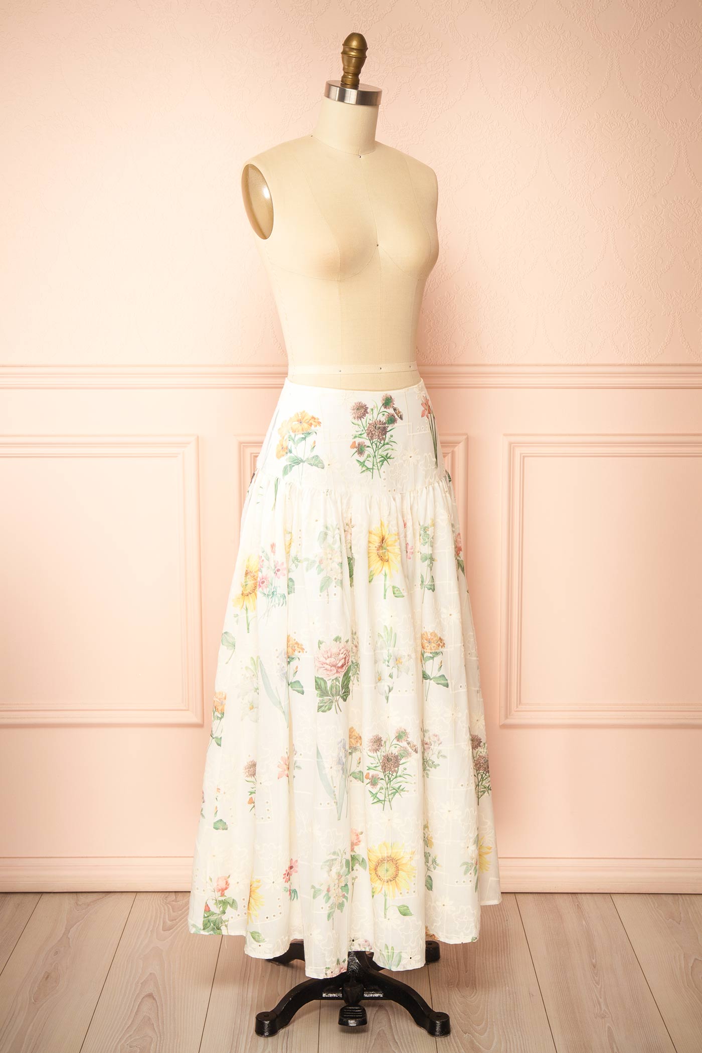 Profile view of Hansi Floral Eyelet Drop-Waist Ivory Maxi Skirt at la boutique 1861