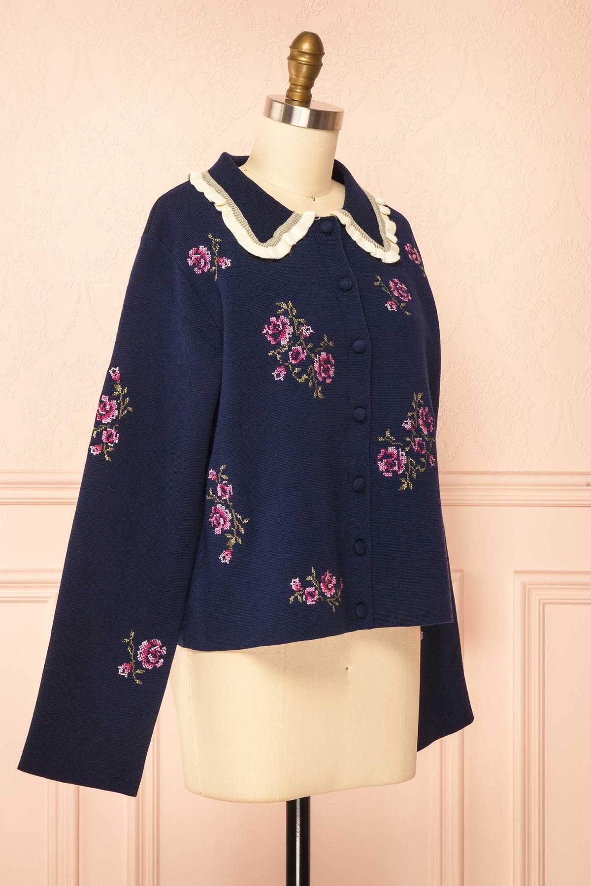 side view of Ichigo Navy Knit Cardigan with Embroidery Flowers at Boutique 1861