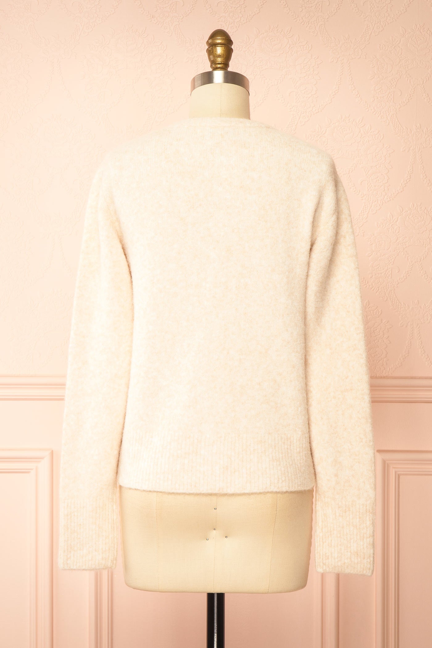  back view of Idalia Ivory Round Neck Cardigan With Button Front at Boutique 1861