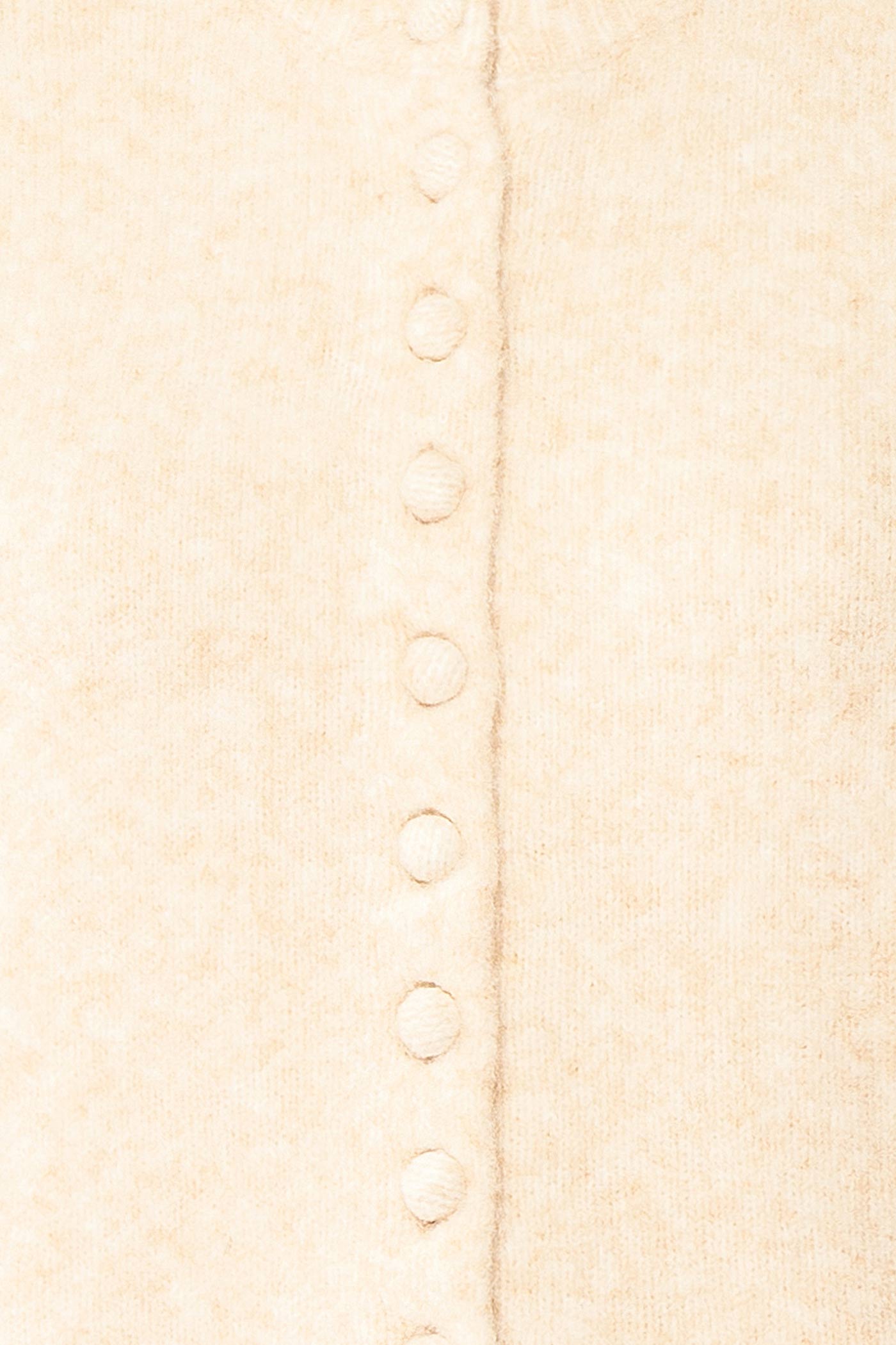 fabric view of Idalia Ivory Round Neck Cardigan With Button Front at Boutique 1861