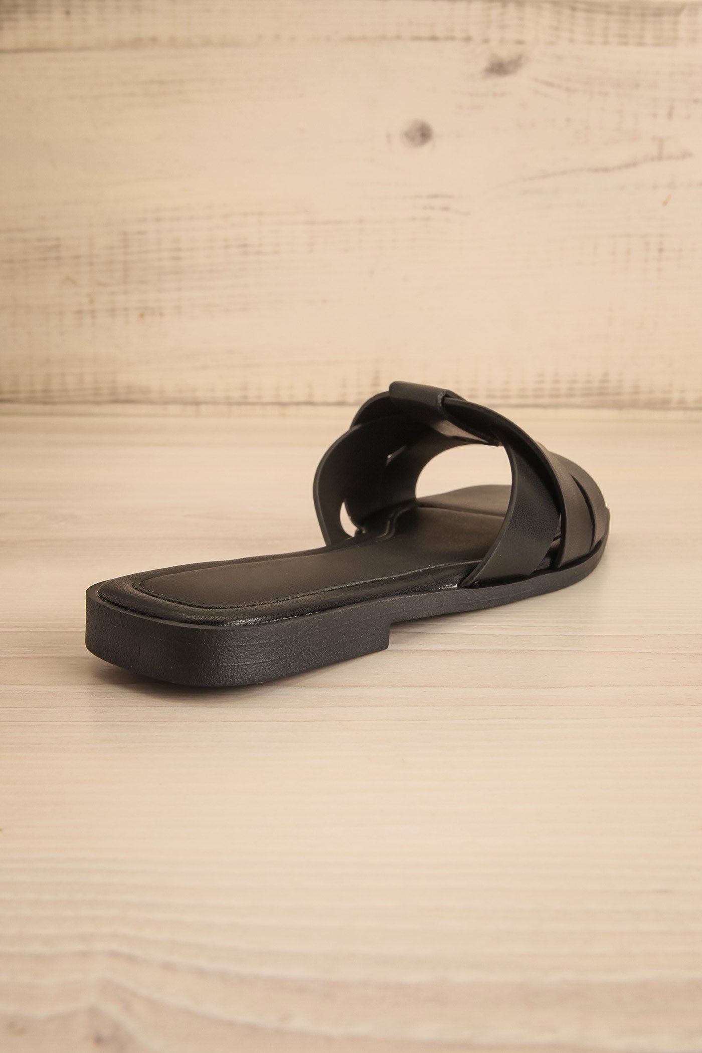 Backview Iguala Black Flat Square-Toe Sandals at la petite garçonne