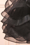 Iksa Black Short Dress w/ Sequins Top | Boutique 1861 bottom close-up