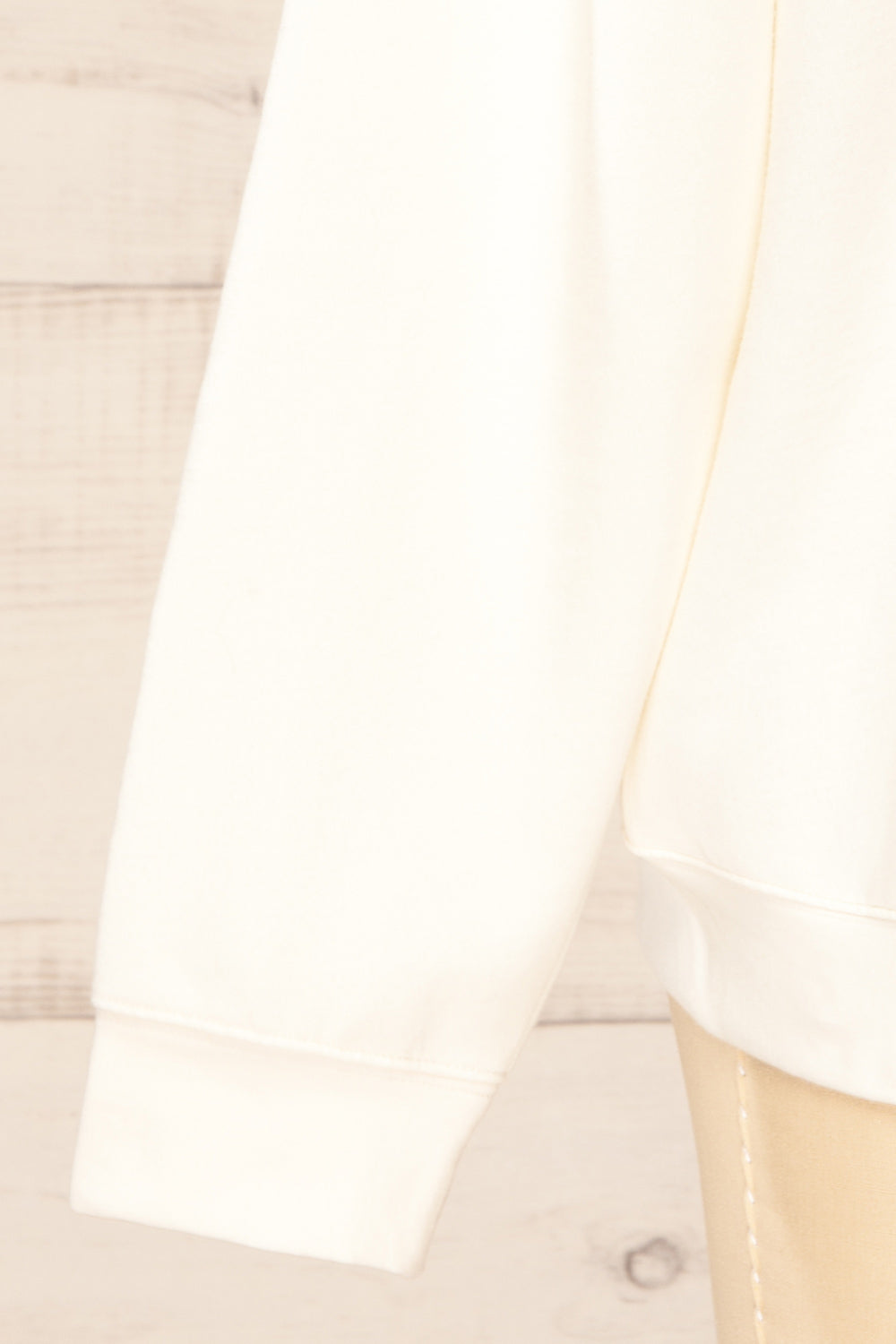 Incheon Oversized Ivory Crewneck Sweater | La petite garçonne bottom close-up