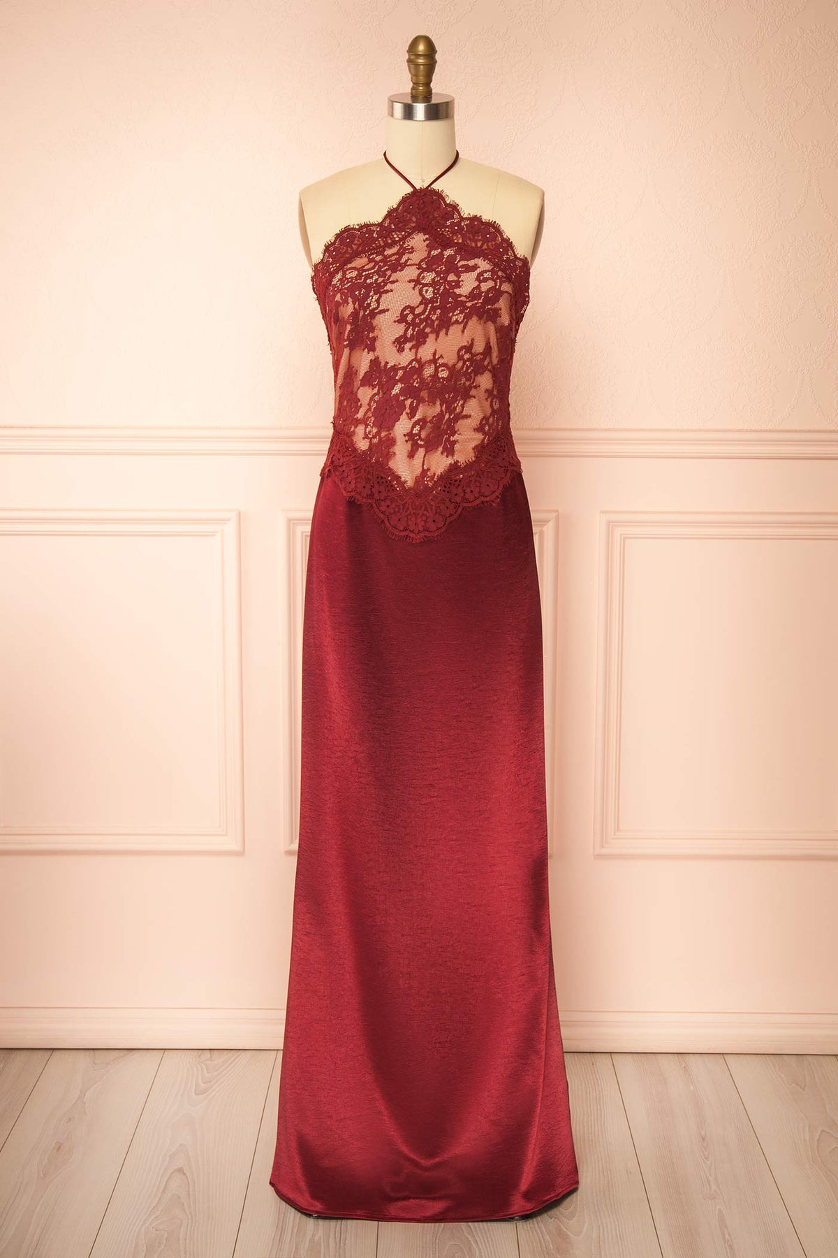 front view of Irimia Burgundy Maxi Satin Halter Dress with Open Back at Boutique 1861