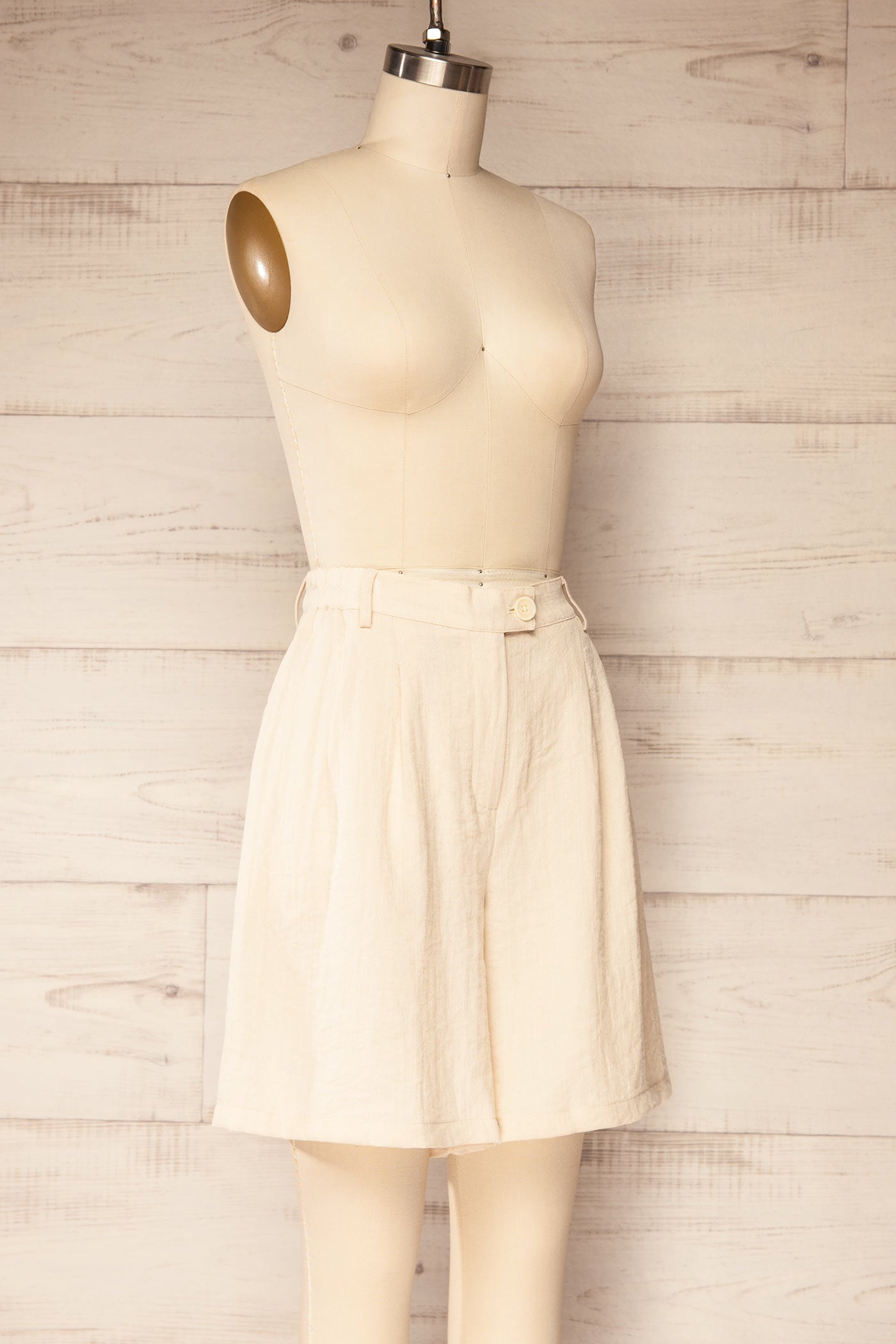 Sideview Itarsi Beige High-Waisted Shorts with Elastic Waist and Pockets at la petite garçonne